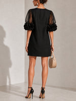 Aurea | Minidress in Organza Nera con Maniche Voluminose e Polsini a Fiore Imponenti