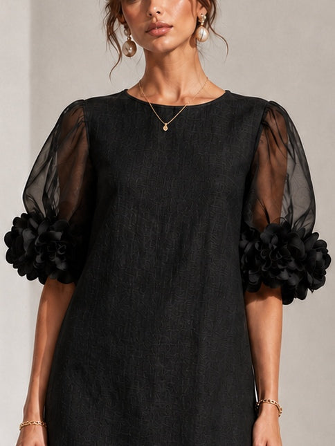 Aurea | Minidress in Organza Nera con Maniche Voluminose e Polsini a Fiore Imponenti