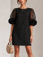 Aurea | Minidress in Organza Nera con Maniche Voluminose e Polsini a Fiore Imponenti